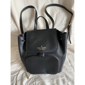 Kate Spade black pebble leather medium backpack exterior zip around pocket
